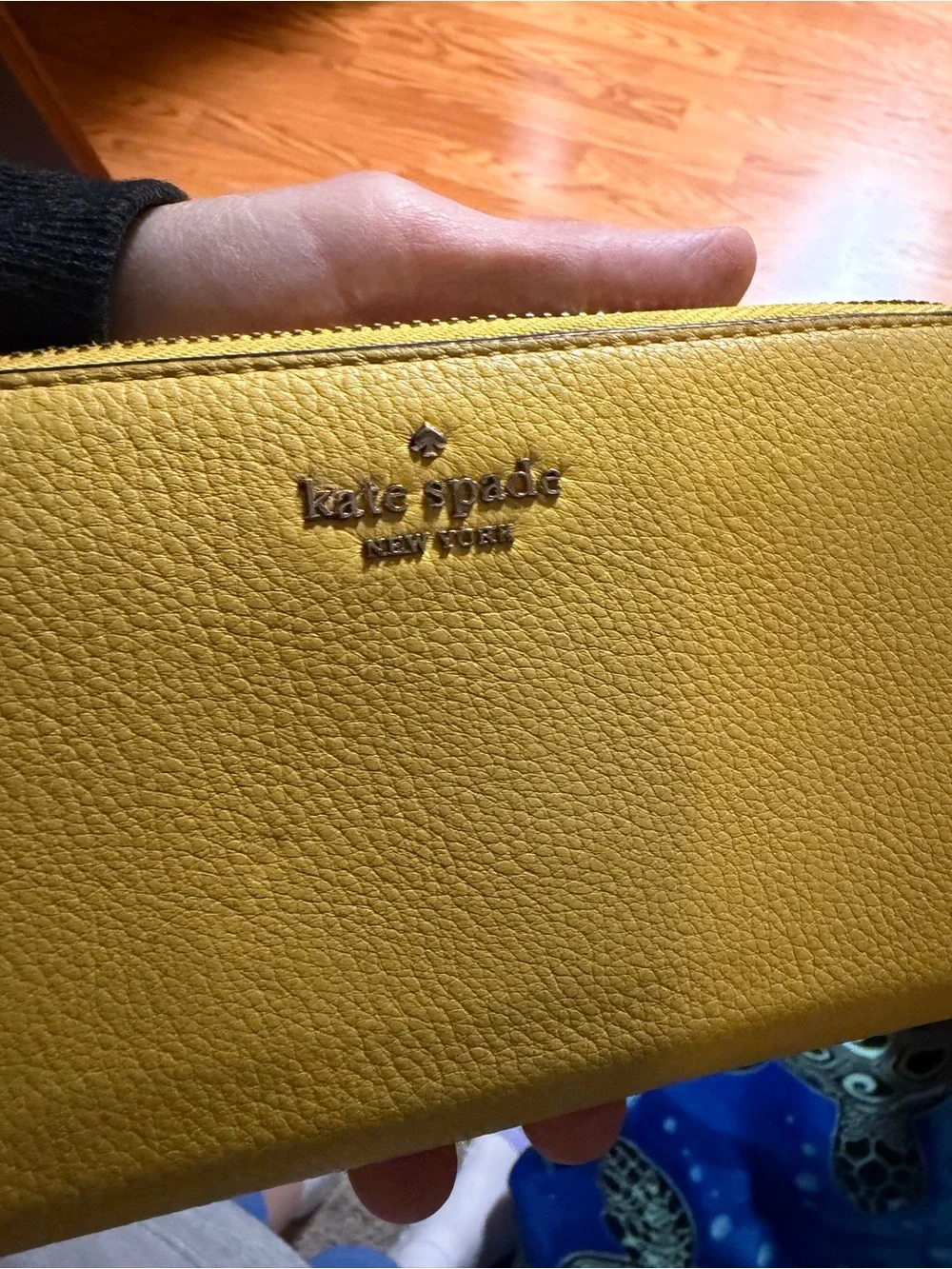 kate spade pebbled yellow zip-around wallet